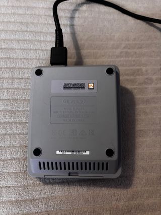 Consola Super Nintendo con 2 mandos