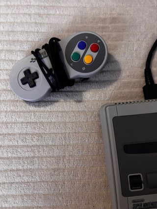 Consola Super Nintendo con 2 mandos