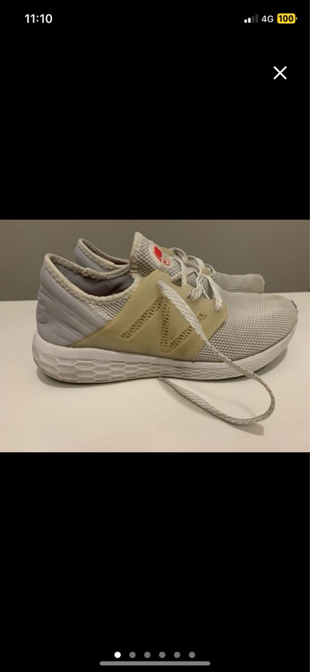 2 Zapatillas New Balance blancas y gris/azul