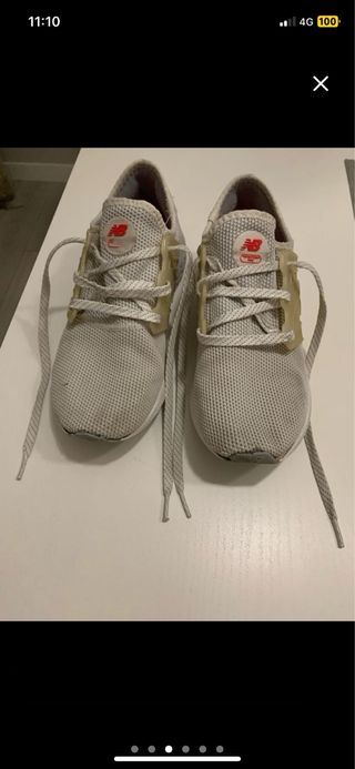 2 Zapatillas New Balance blancas y gris/azul