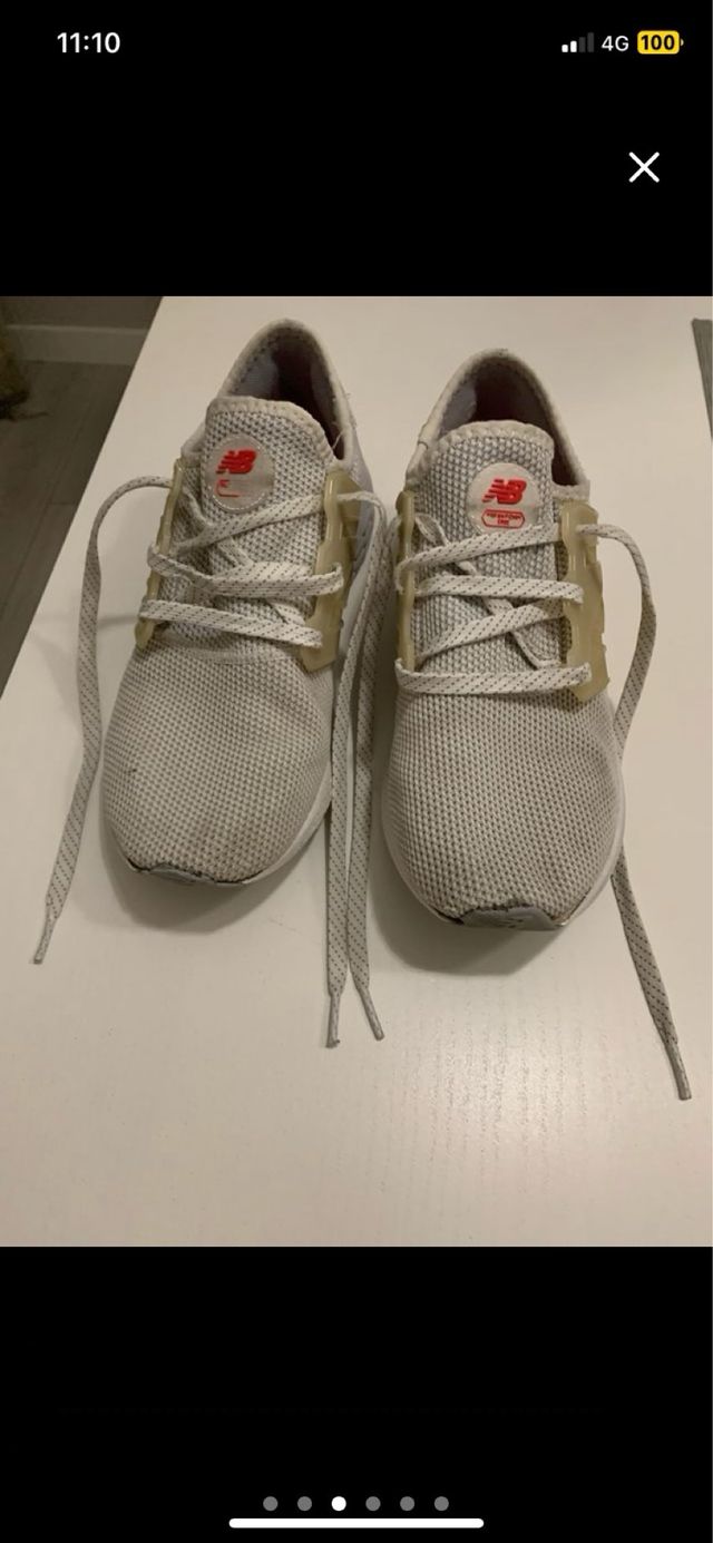 2 Zapatillas New Balance blancas y gris/azul