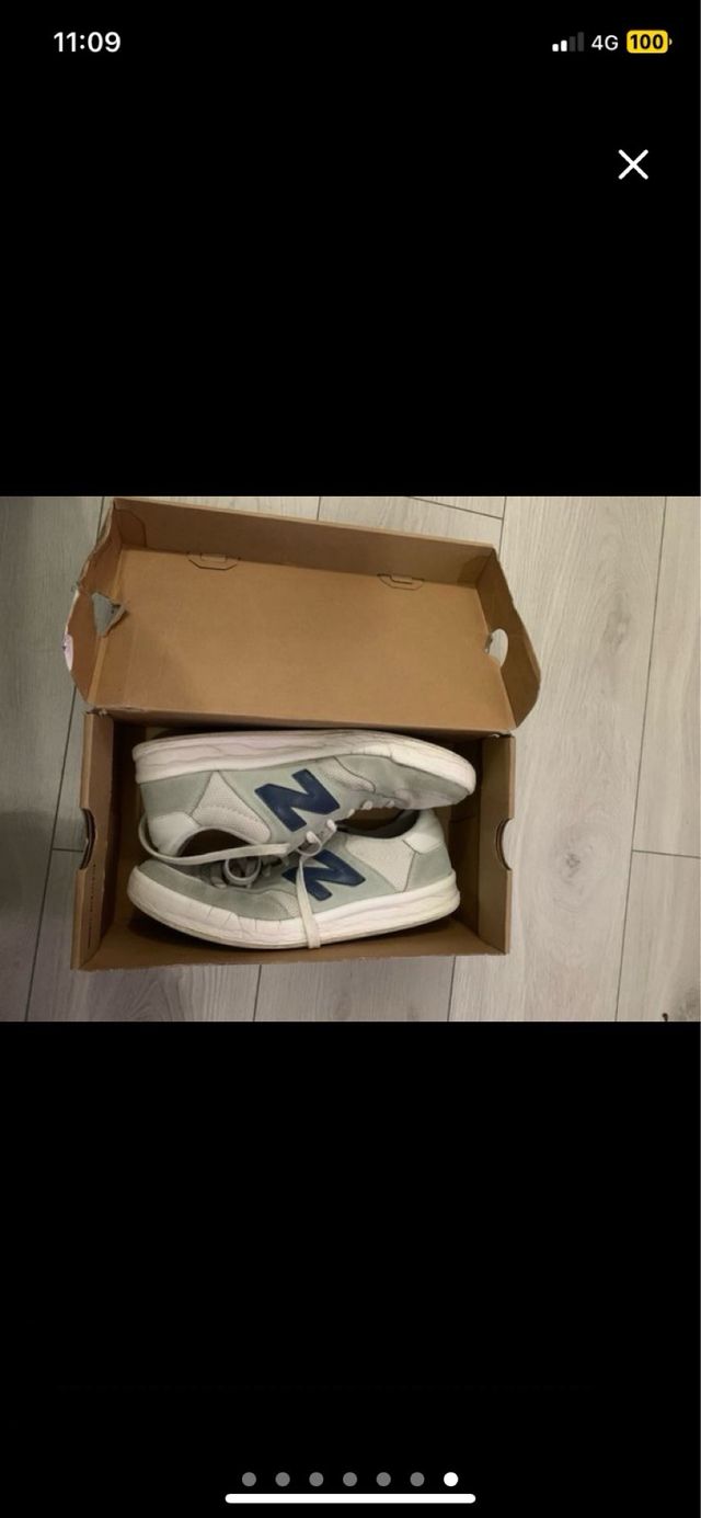 2 Zapatillas New Balance blancas y gris/azul