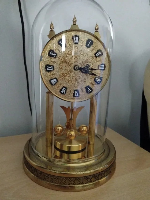 Orologio pendolo vintage dorato