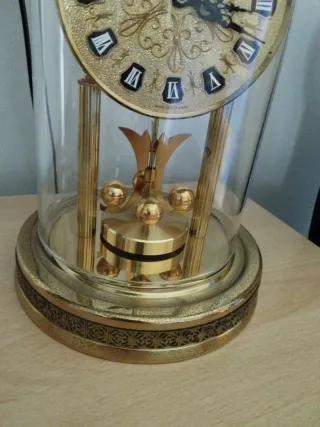 Orologio pendolo vintage dorato