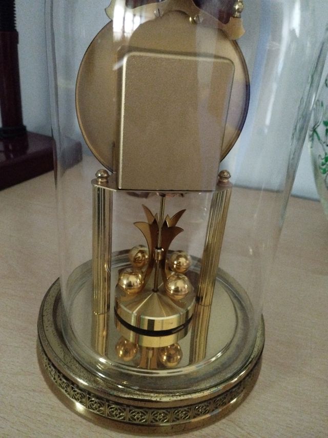 Orologio pendolo vintage dorato