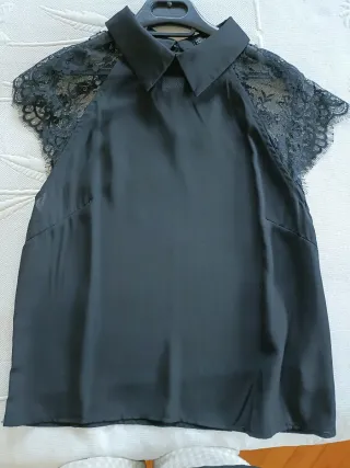 Blusón negro con transparencias