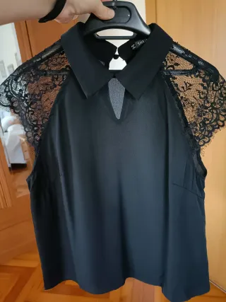 Blusón negro con transparencias
