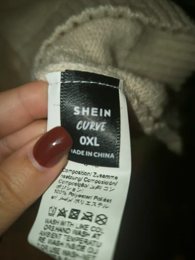 Chaleco de punto beige con bolsillos