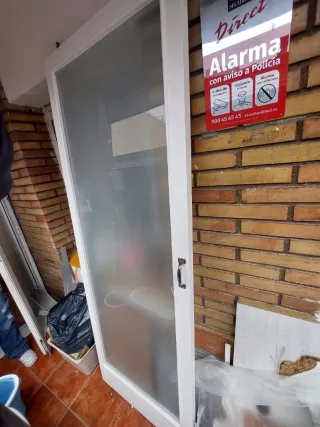 Puerta corredera de cristal