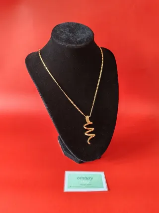 Collana con ciondolo serpente dorato