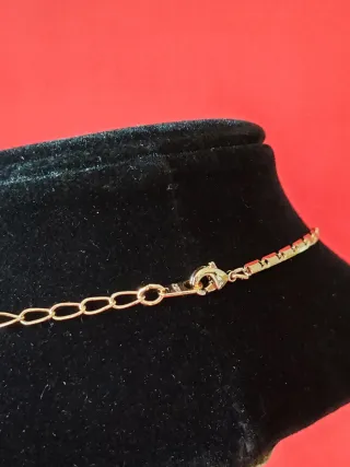 Collana con ciondolo serpente dorato