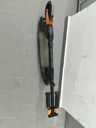 Patinete.Negro Naranja