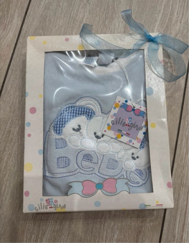 Tutina ciniglia celeste neonato