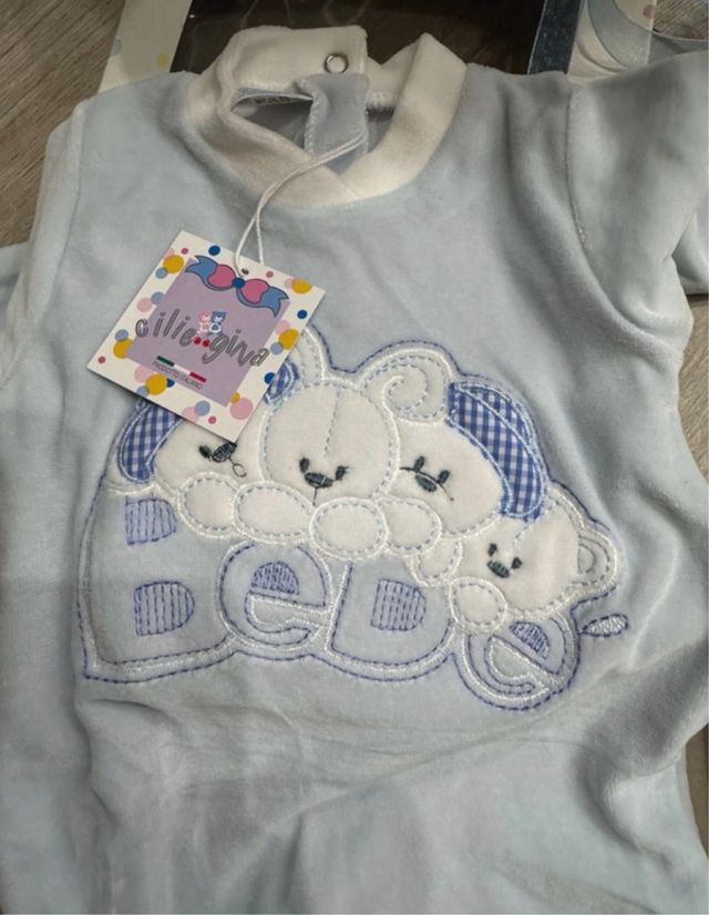 Tutina ciniglia celeste neonato