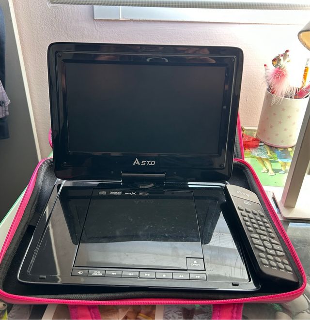 Funda reproductor DVD rosa flores