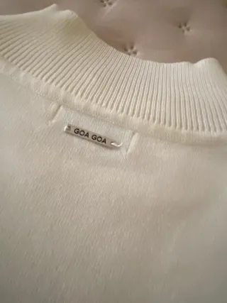 Jersey fino cuello alto manga acampanada