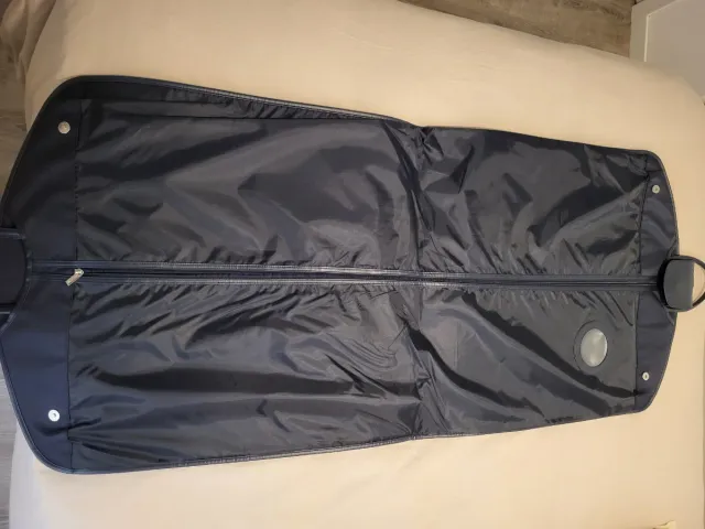 Portatrajes marca Scalpers, talla L, color azul.