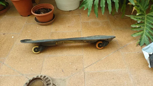 Waveboard Oxelo Negro y Dorado