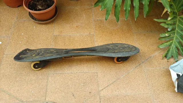 Waveboard Oxelo Negro y Dorado