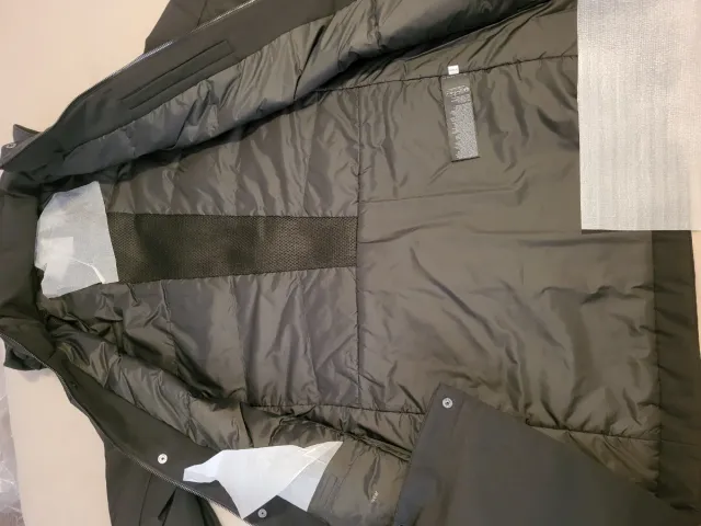 Abrigo Uniqlo plumón verde XS-S.