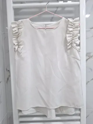 Blusa Top sin mangas blanco con volantes