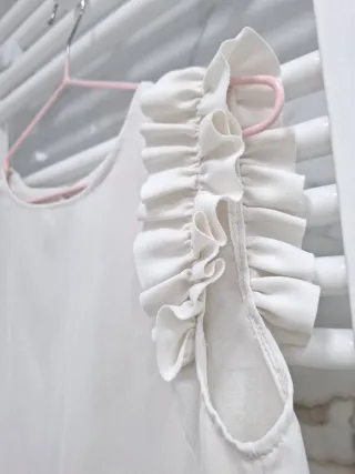 Blusa Top sin mangas blanco con volantes