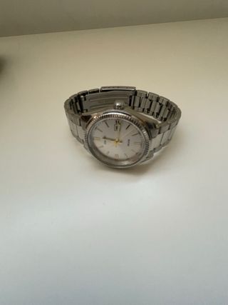 Reloj Casio Dorado y Plateado