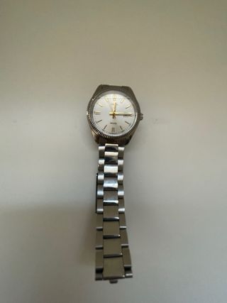 Reloj Casio Dorado y Plateado