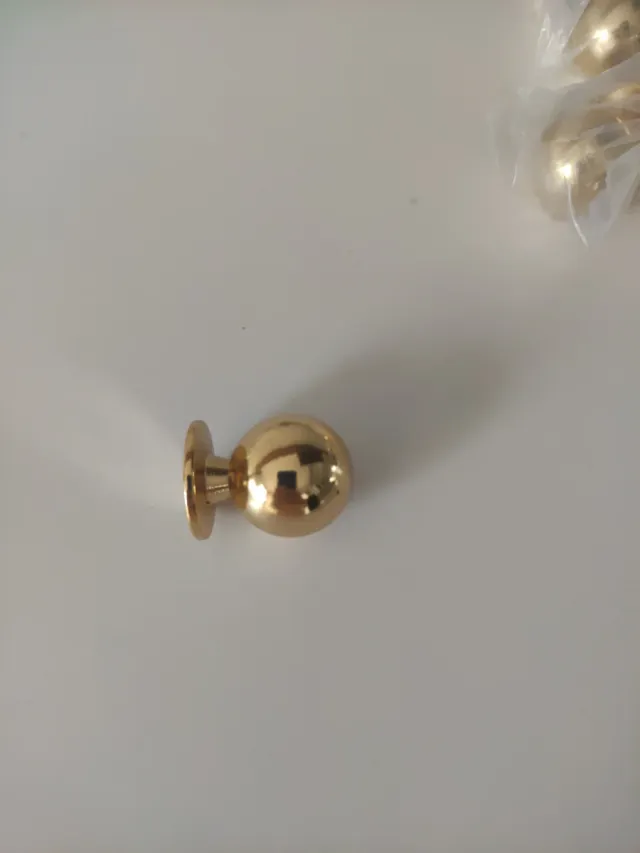 Tiradores dorados para armario/cajón