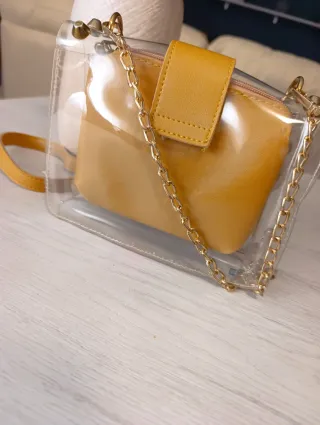 Bolso transparente dorado fiesta