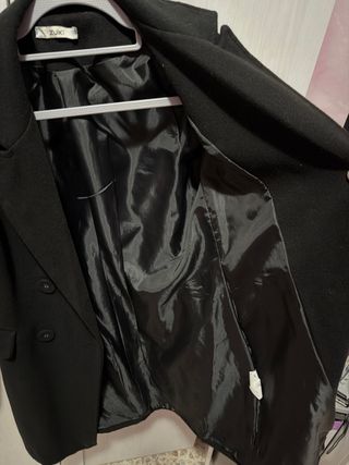 Cappotto nero doppiopetto