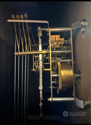 Orologio a pendolo intarsiato