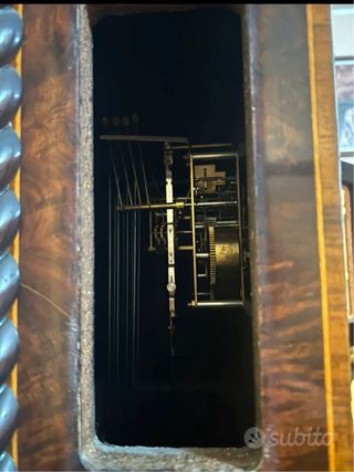 Orologio a pendolo intarsiato