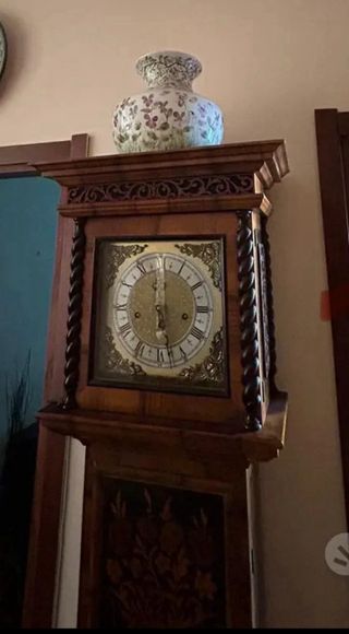 Orologio a pendolo intarsiato