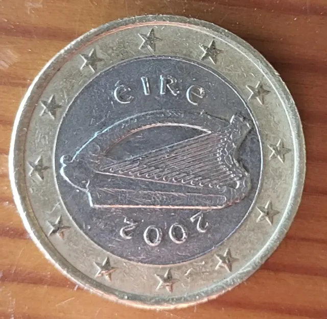 2 Monedas 1 Euro 2002 de 2002 y 20 céntimos 2002
