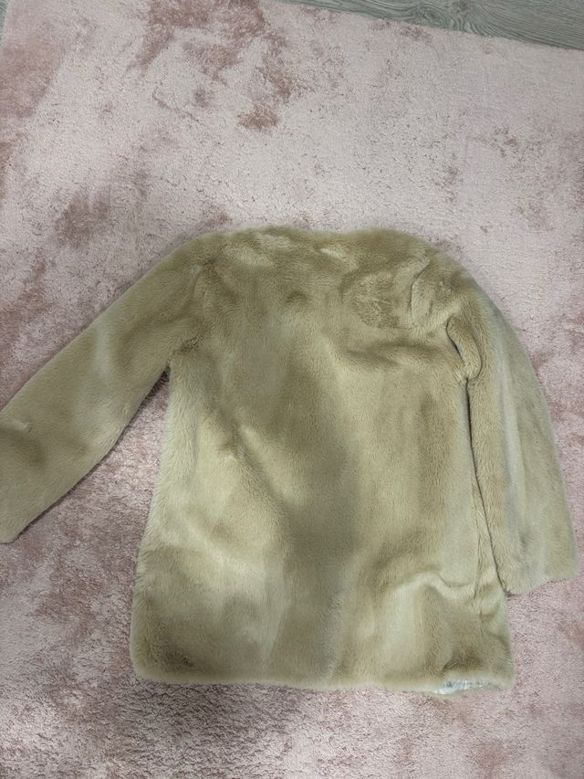 Casaco de pelo bege forrado