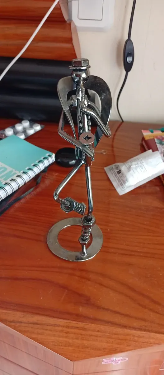 Figura de metal saxofonista