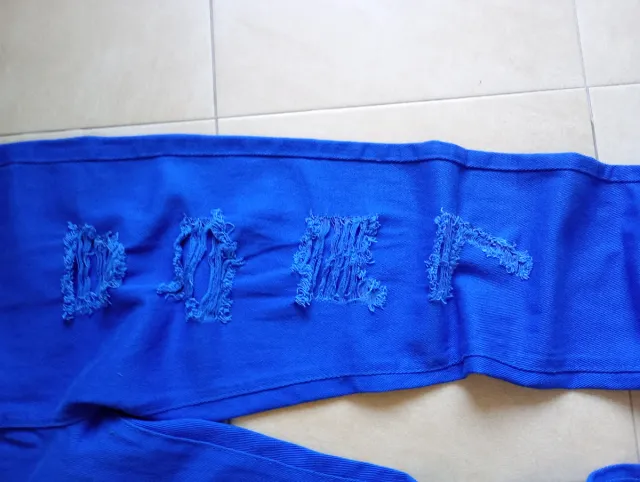 Jeans uomo strappati blu taglia M