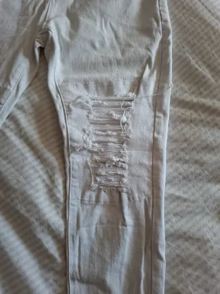 Jeans blancos elásticos rotos hombre