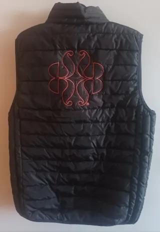 Chaleco Roly acolchado con logo de Royal Bliss.