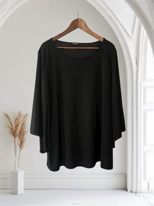 Blusa Negra Elena Miro por estrenar.