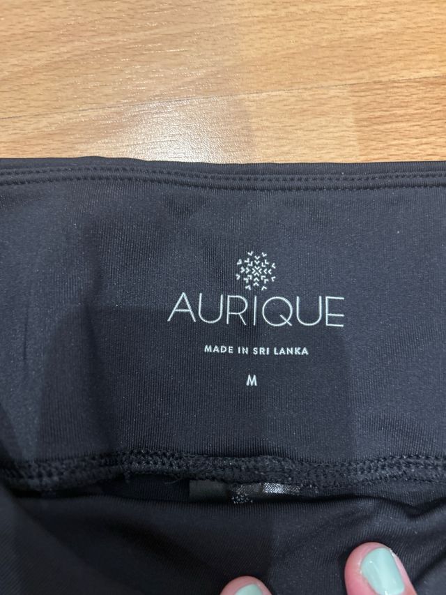 Leggings negros con detalle verde