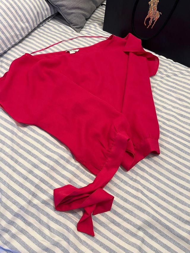 Blusa con lazada fucsia