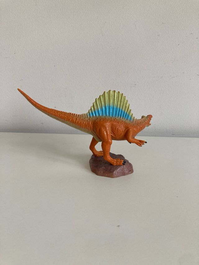 Dinosaurio naranja con vela coleccionismo