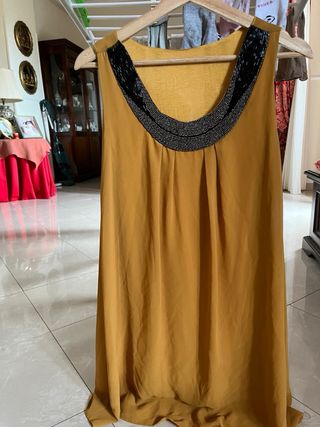 Vestitino oro con perline