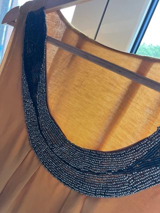 Vestitino oro con perline