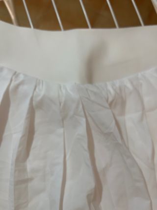 Falda pantalón blanca plisada