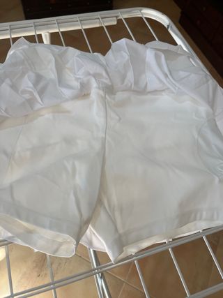 Falda pantalón blanca plisada