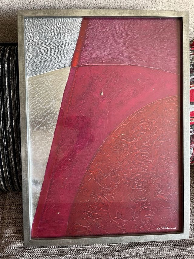 dos cuadros abstractos modernos con el marco metal