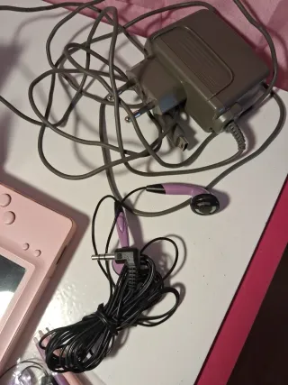 Nintendo DS Rosa con Correa y juegos